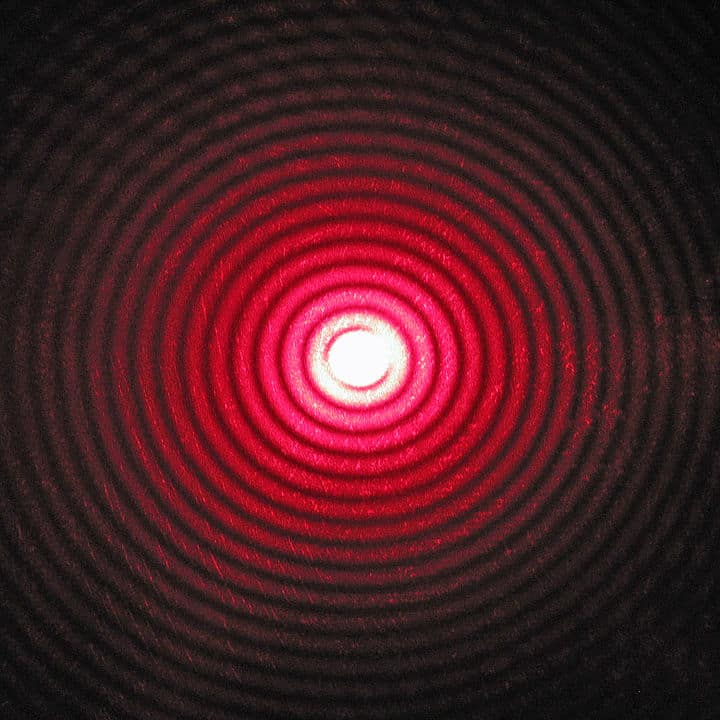 Properties of electromagnetic waves - A circular hole diffracting red laser light